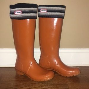 Tall orange Hunter boots